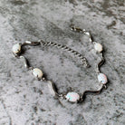 Sterling Silver wave 8x6mm Oval White Opal bracelet - Masterpiece Jewellery Opal & Gems Sydney Australia | Online Shop